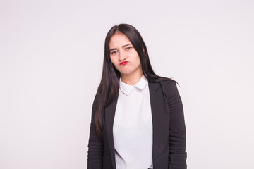 Feelings, emotions and people concept - Sad asian young woman on white background