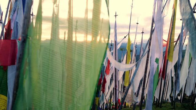 Buddhist prayer flags blowing In the wind. Shot in Bhutan.