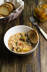 Risotto with vegetables, eggplant and peppers.