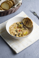 Risotto with vegetables, eggplant and peppers.
