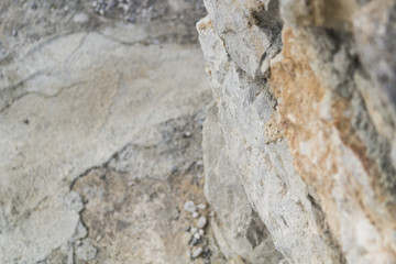 Stone wall as a background or texture, old castle stone wall