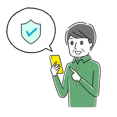 スマホを操作するシニア男性