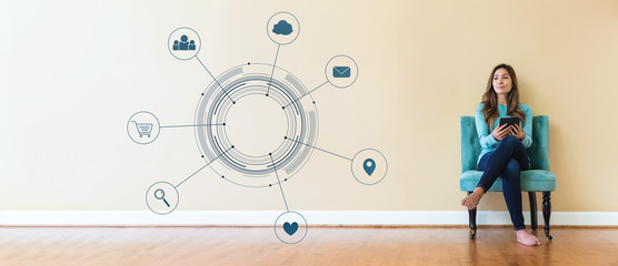 Virtual icons with young woman holding a tablet computer