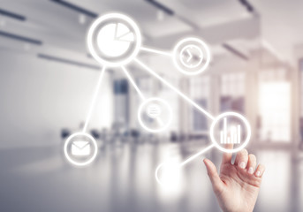 Modern office interior and close of businesswoman hand choosing 