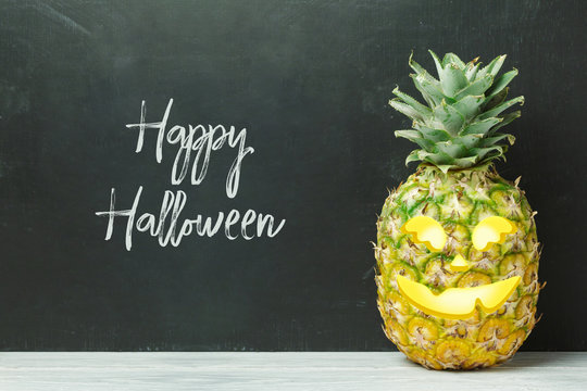 Halloween Holiday Concept With Jack O Lantern Pineapple