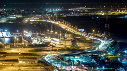 Fototapeta na wymiar New Sheikh Khalifa Bridge in Abu Dhabi night timelapse, United Arab Emirates