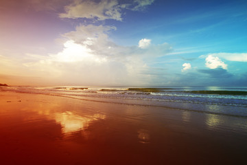 Fototapeta na wymiar Typical seascape with sand beach. Dramatic summer morning on the east coast of Thailand.