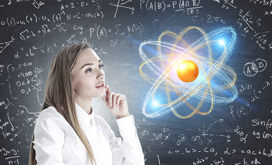 Inspired woman thinking, atom physics science