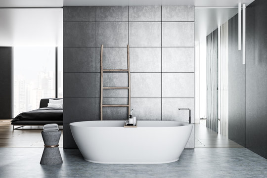 Gray tile bathroom, tub and ladder, bedroom