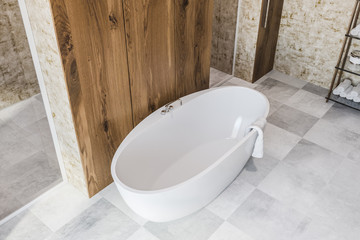 Naklejka na ściany i meble Wooden bathroom interior top view, white tub