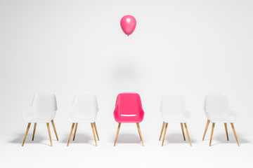 White chairs row, pink chair with balloon, choice