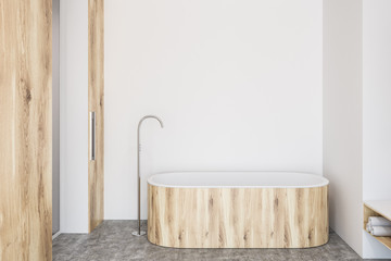 White bathroom interior, wooden tub