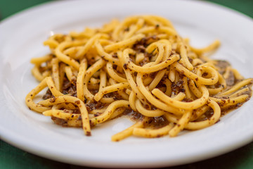 Spaghetti (Spaghettoni) with mushrooms. Traditional Italian dish.