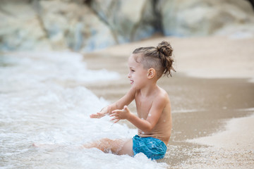 little boy in the sea in Thailand
