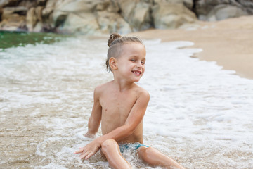 little boy in the sea in Thailand