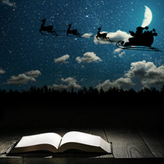 book against a moonlight night city