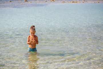 little boy in the sea in Thailand