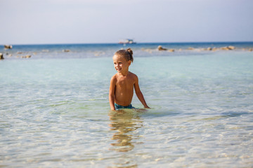 little boy in the sea in Thailand