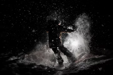 Printed kitchen splashbacks Winter sports Snowboarder in sportswear jumping on the board at night