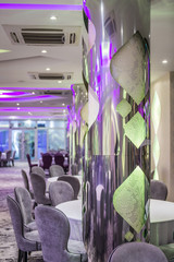 Hotel restaurant interior with lightening pillar