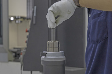 CNC tools of hand man setting tooling
