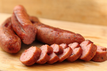 Sliced grilled sausage on a table
