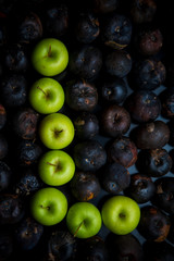 letters of the alphabet lined with green apples
