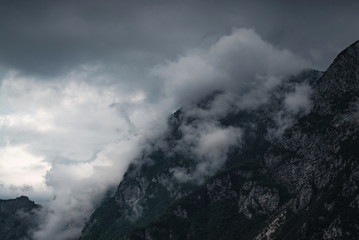 stormy weather in mountains ,clouds ,foggy in bled slovenia