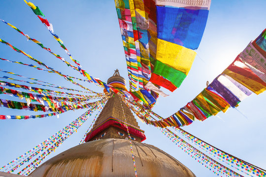 Boudhanath Stupa With Colorful Prayer Flags, Buddha Eyes And Golden Mandala In Kathmandu, Nepal, Most Famous Tibetan Buddhism Symbol Among Nepalese Temples, World Heritage Site
