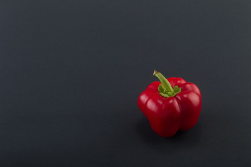 Sweet bell pepper on a colored background. Studio light. Top view