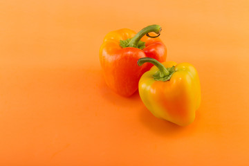 Sweet bell pepper on a colored background. Studio light. Top view
