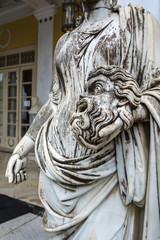 A tragic mask in the hand of Statue of Melpomene, the muse of tragedy, on the balcony of Achillion...