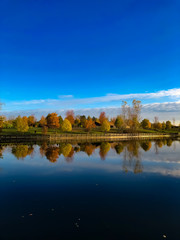 Fall in Michigan with beautiful colors over a lake 