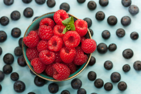 Delicious fresh raspberries in a bowl.