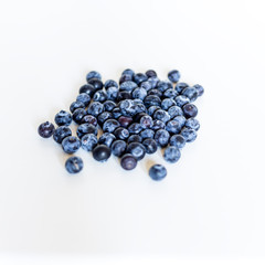 Ripe blueberries isolated on white background