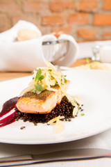 Baked salmon, beetroot mousse, black lentils and pear