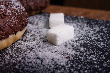 Doughnut and sugar cubes