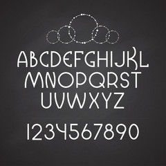 Latin alphabet on the chalkboard background