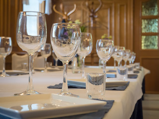 Table served with glasses in the restaurant.