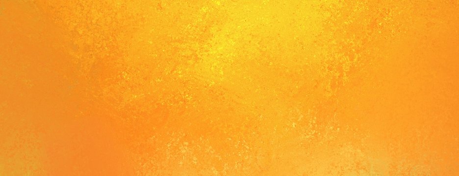 bright warm orange and yellow gold colors in fiery textured autumn background colors