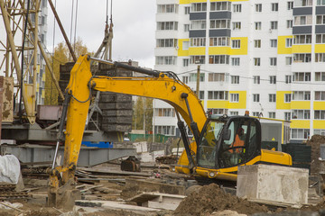 use of the excavator on building of the house