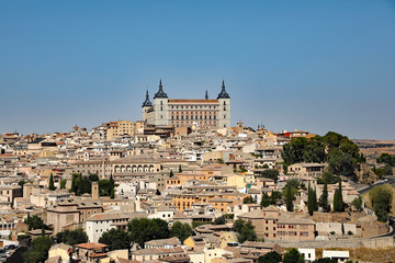 Fototapeta na wymiar The Alcázar of Toledo is a stone fortification located in the highest part of Toledo, Spain. Once used as a Roman palace in the 3rd century, it was restored and is now a major tourist destination.