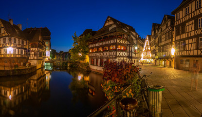 Sunset along the Ill River in Petite France areas of Strasbourg in the Alsace region of France. 