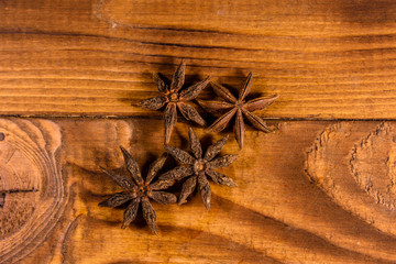 Star anise on a wooden table. Top view