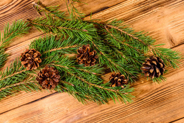 Fir tree branches on a wooden table