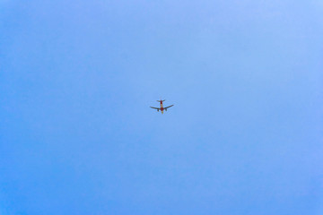Fototapeta na wymiar Plane is taking off from an island