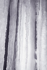 winter background with close-up view of icicles