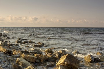 the sea, rocks and clouds
