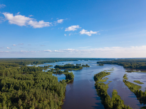 Aerial view of river Nemda with green riverside and islands. Summer 2018, Russia