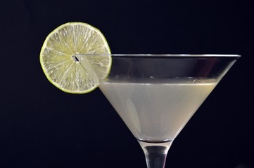 glass of daiquiri cocktail on black background